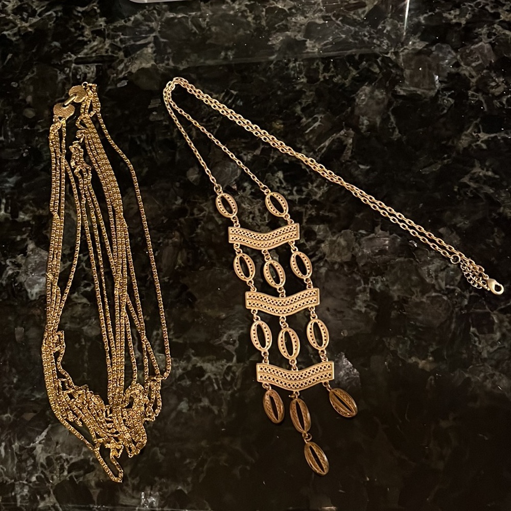 Four strand plain long gold chain and dramatic pendant necklace